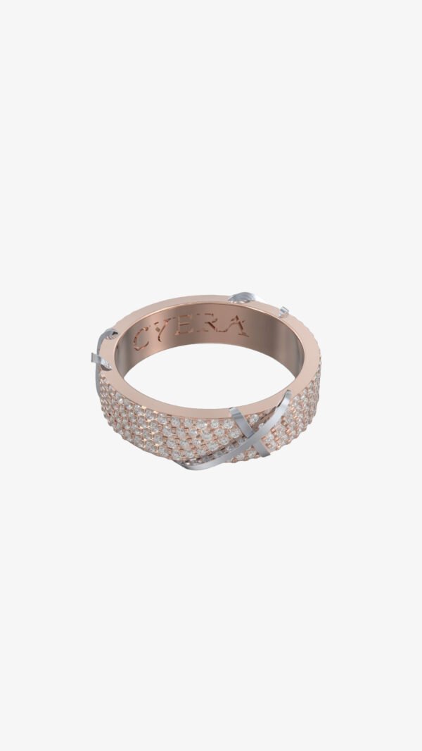 Elegant Apex Collection rings with diamond line, yellow gold arrow, and ribbon-crossing diamond pattern, showcasing refined craftsmanship.